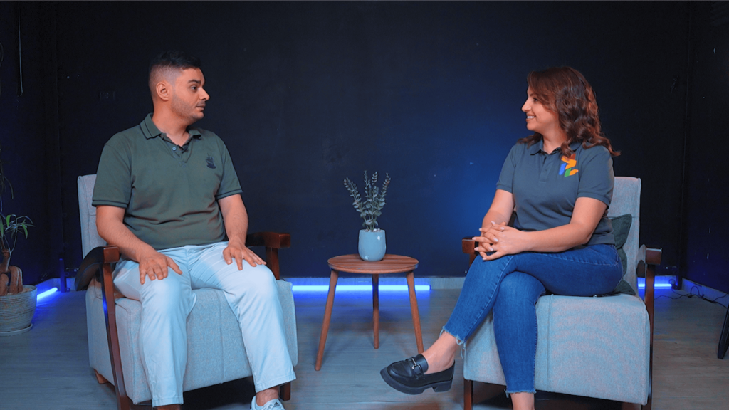 an AI tech expert and an interviewer sitting down in an interview